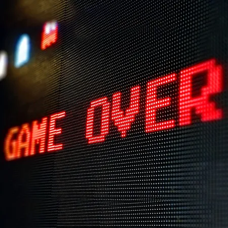 8 bit text red game over sign
