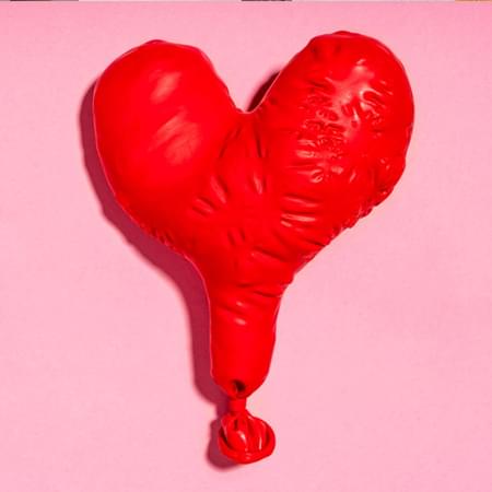 pink background with a red balloon heart