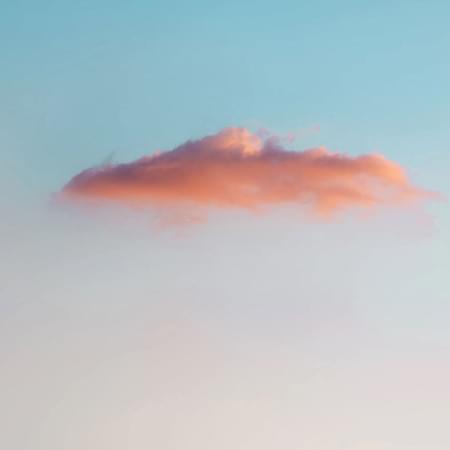 solo cloud with soft blue to orange gradient
