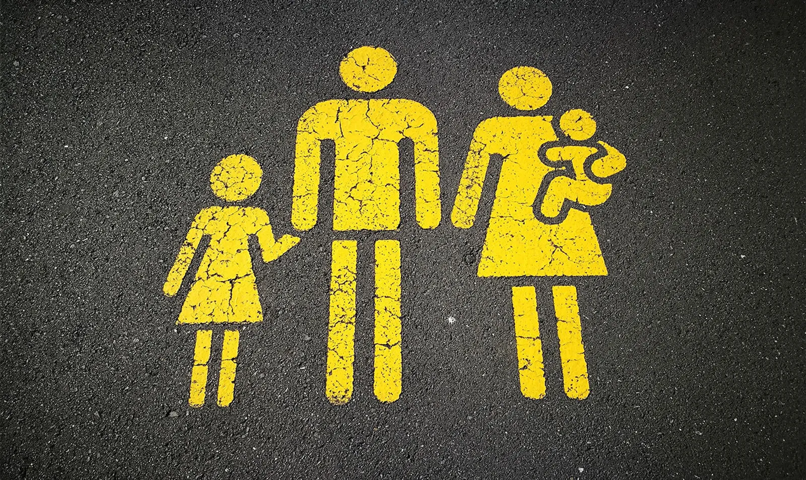 road sign with yellow family